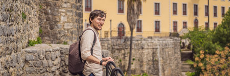 Man tourist in Herceg Novi old town. Historical and touristic center of Herceg Novi. Montenegro...