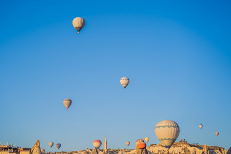 Colorful hot air balloon flying over Cappadocia, Turkeyの写真素材