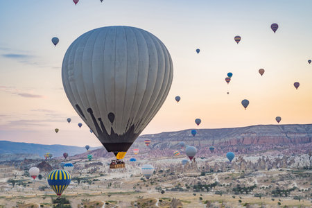 Colorful hot air balloon flying over Cappadocia, Turkeyの写真素材
