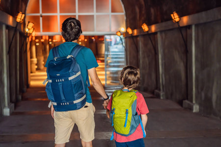 father and son tourists enjoying Beautiful cistern in Istanbul. Cistern - underground water reservoir build in 6th century, Istanbul, Turkey, Turkiyeの写真素材