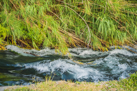 Lower Duden Falls drop off a rocky cliff falling from about 40 m into the Mediterranean Sea in amazing water clouds. Tourism and travel destination photo in Antalya, Turkey. Turkiye.の写真素材