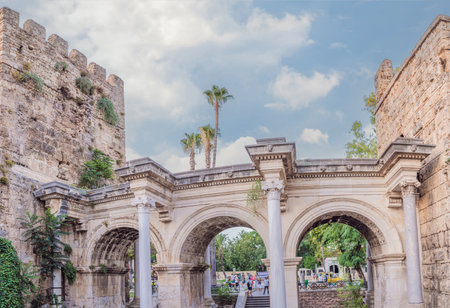 Hadrian Kapisi turkey landmark city history. Popular tourist attraction - ancient Roman Hadrian Gate in old town Antalya, Turkey on a summer day. Turkiyeの写真素材