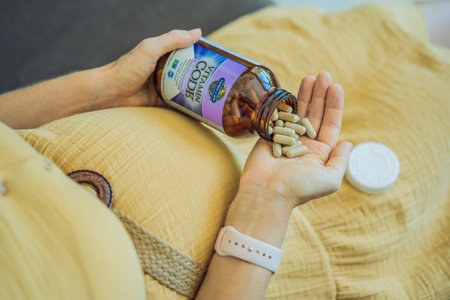 12.16.22, USA, Miami: A pregnant woman received an iherb package or bought at whole foods. garden of life, vitamin code raw prenatal. Vitamins and minerals for a healthy pregnancy at iherbのeditorial素材