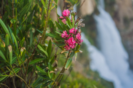 Lower Duden Falls drop off a rocky cliff falling from about 40 m into the Mediterranean Sea in amazing water clouds. Tourism and travel destination photo in Antalya, Turkey. Turkiye.の写真素材
