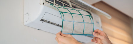 cleen out dust from air conditioner filter BANNER, LONG FORMATの写真素材