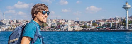 Happy man enjoying the sea from ferry boat crossing Bosphorus in Istanbul. Summer trip to Istanbul...