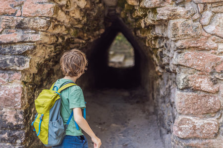 Boy tourist at Coba, Mexico. Ancient mayan city in Mexico. Coba is an archaeological area and a...