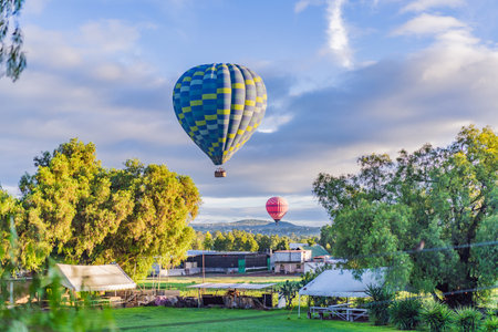 An aerial view of hot air balloons. Adventure travel, cultural heritage, and aerial exploration conceptの写真素材