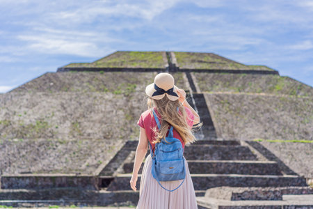 Female tourist exploring Teotihuacan, Mexico. Cultural heritage, ancient ruins, and archaeological...