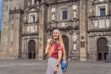 Female tourist in front of Catedral de Puebla, Mexico. Travel, cultural heritage, and historic architecture exploration conceptの写真素材