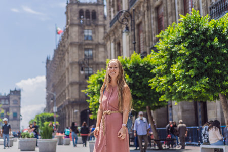 Female tourist in the central square of Mexico City, Zocalo. Cultural exploration, travel, and historic architecture conceptの写真素材