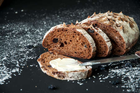 Freshly baked homemade artisan sourdough rye and white flour bread. Sliced. Top view. Close up. Copy space.の写真素材