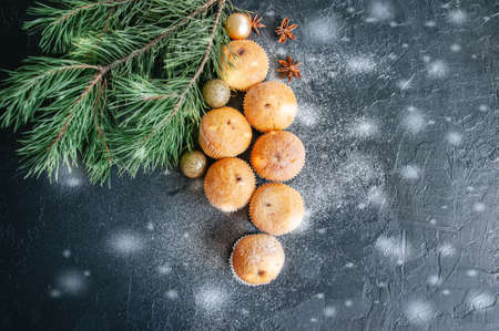 Set of vanilla muffins with chocolate cream filling. Blue stone background.の写真素材