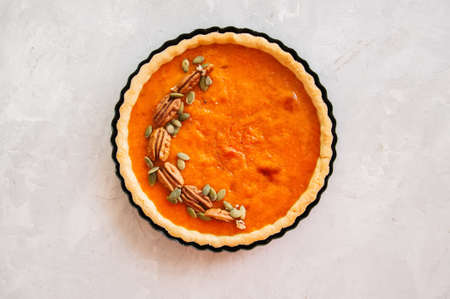 Pumpkin pie over white stone background. Top view.の写真素材