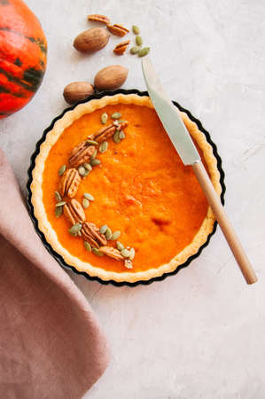 Pumpkin pie over white stone background. Top view.の写真素材
