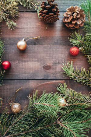 Christmas background with fir tree branches and balls