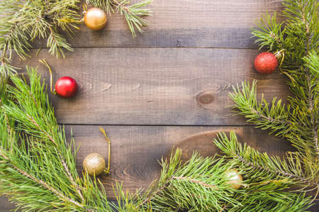 Christmas background with fir tree branches and ballsの写真素材