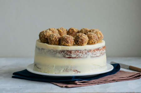 Homemade fruity Hummingbird cake with spices and pecan nuts, Rustic syle.の写真素材