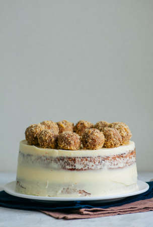 Homemade fruity Hummingbird cake with spices and pecan nuts.の写真素材