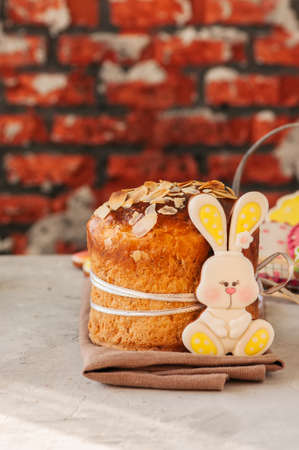 Easter orthodox sweet bread, cottage cheese kulich, colorful bunny cookie