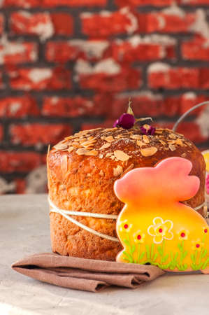 Easter orthodox sweet bread, cottage cheese kulich, colorful bunny cookieの写真素材