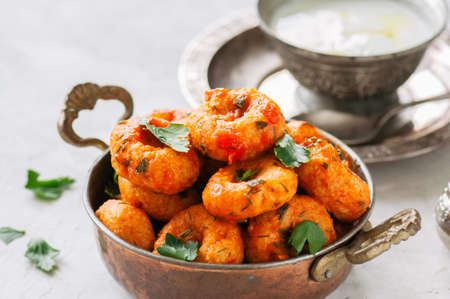 Traditional Turkish food - fellah koftes, polpettes from bulgur and semolina in tomato sauce with...