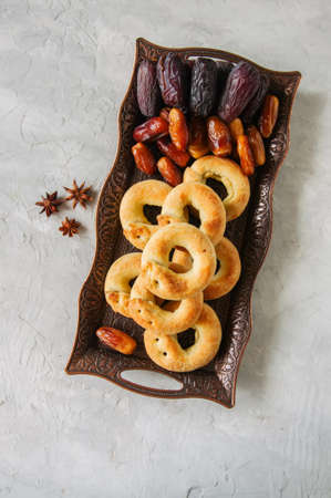 Traditional arabic date ring cookies - kaak bi ajwa, popular cookies for Eid holidays. Top view. 