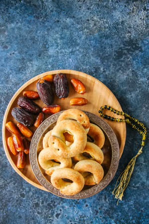 Traditional arabic date ring cookies - kaak bi ajwa, popular cookies for Eid holidays. Top view. の写真素材