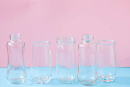 Set of different sizes of transparent mugs or bottles. Close up.の写真素材
