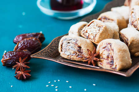 Makrouta - middle eastern cookies with date filling. Traditional arabic date cookies, popular...