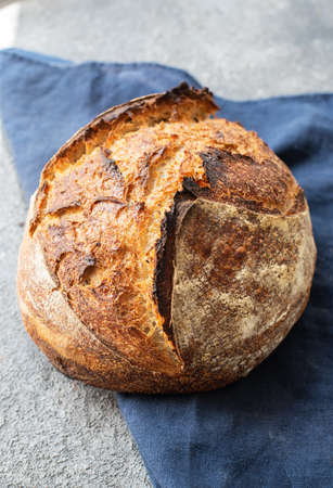 Homemade artisan sourdough whole wheat bread. Healthy bread and organic food.