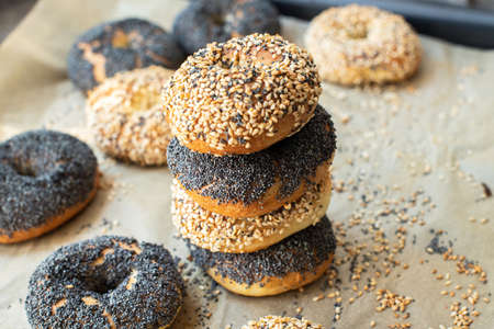 Freshly baked sesame and poppy seeded bagels. Close up.の写真素材