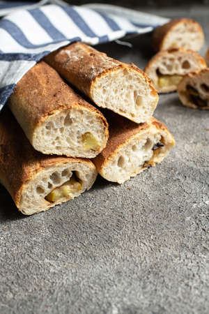 Sourdough baguetts with different fillings. Close up.