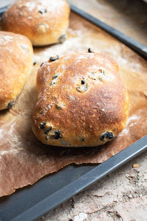 Freshly baked chabatta with olives. Close up.の写真素材