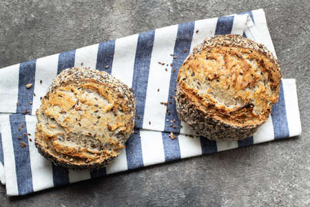 Homemade healthy sourdough bread with seeds and cereals. Close up.の写真素材