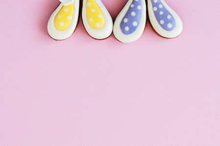 Easter background concept. Polka dot easter bunny cookies on a pink background. top view. copyspace.の写真素材