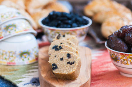 Kospa or jent - Kazakh traditional treat with raisins or nuts, usually made with flour of roasted...