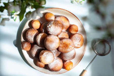 Fried donuts on a plate. top view.の写真素材