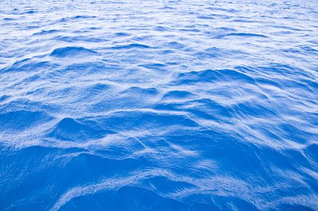 Background of turquoise sea water closeup の写真素材