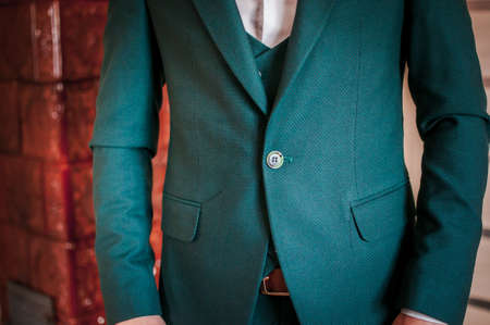CLoseup green jacket on the man