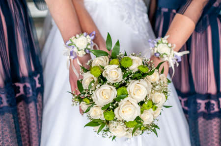 Bouquet of flowers in the hand of the brideの写真素材