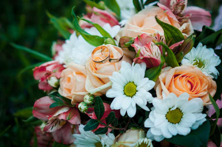 Colorful bouquet of flowers on the green grassの写真素材