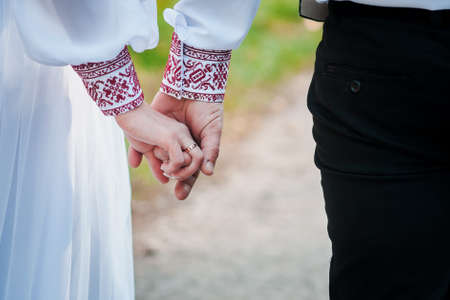 Couple of married holding handsの写真素材