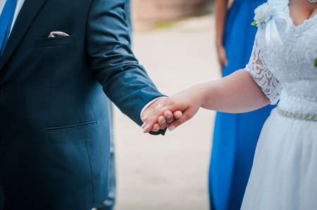 Couple of married holding hands