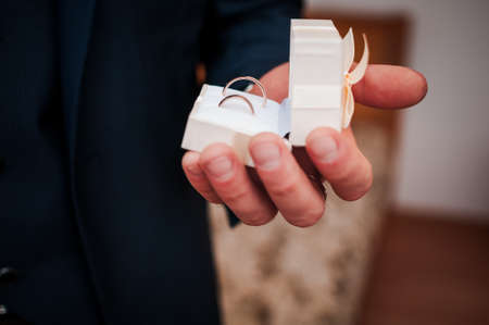Gold wedding rings in the white boxの写真素材