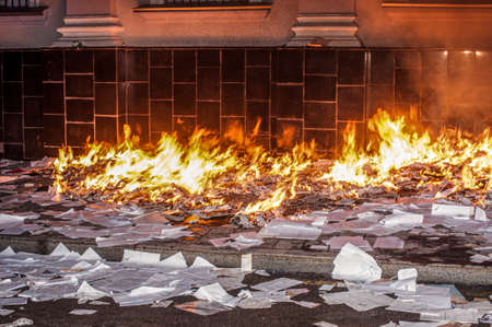Ternopil, Ukraine - 18.02.2014 - Burning documents lie on a burning pileのeditorial素材
