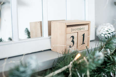 wooden calendar with the inscription December 31の写真素材