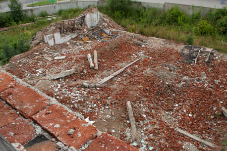 Aerial view on the destroyed walls from brick