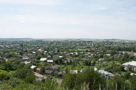 View on the city houses from the hillの写真素材
