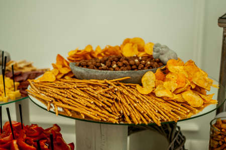 Buffet with different types of snacks and nutsの写真素材